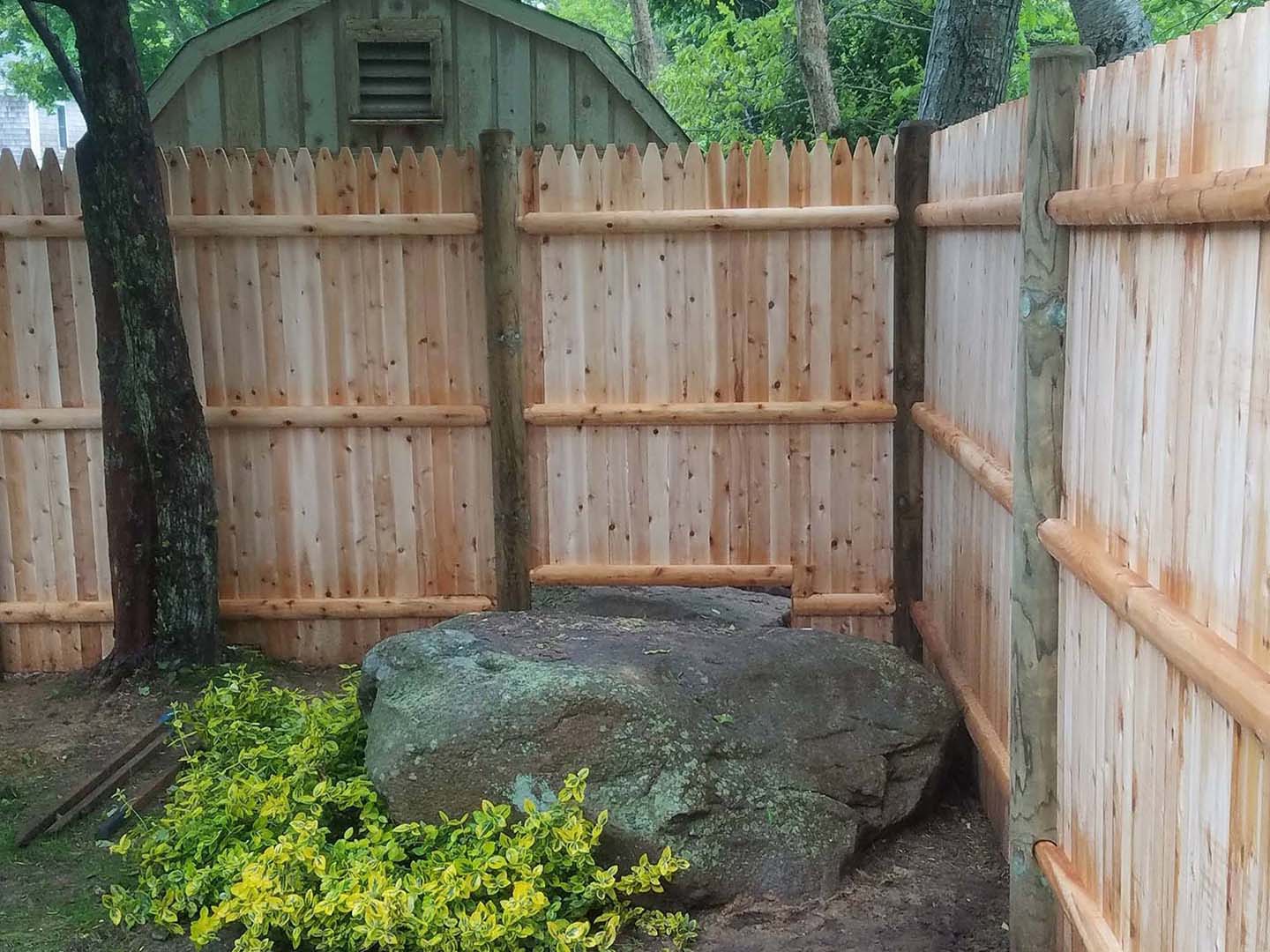 Acushnet MA stockade style wood fence